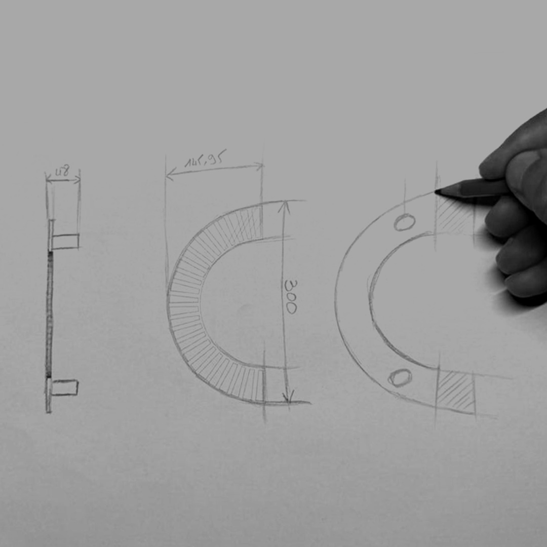 A person sketching a hardware concept